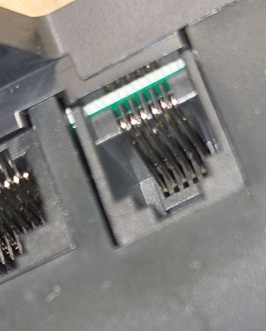 Close-up of the free RJ12 jack labelled F on the control box